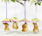 Preview: Strauchbehang Dolomit Hasen mit Blütenschirm  staruchbehang porzellan osterdekoration