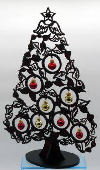 Weihnachtsbaum Holz in schwarz mit roten und goldenen Glaskugeln Tischdekoration