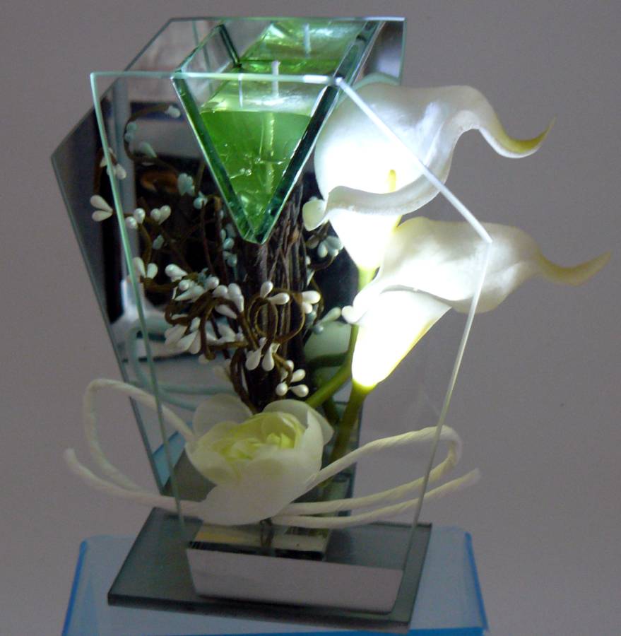 Blumendekoration beleuchtet im Glas