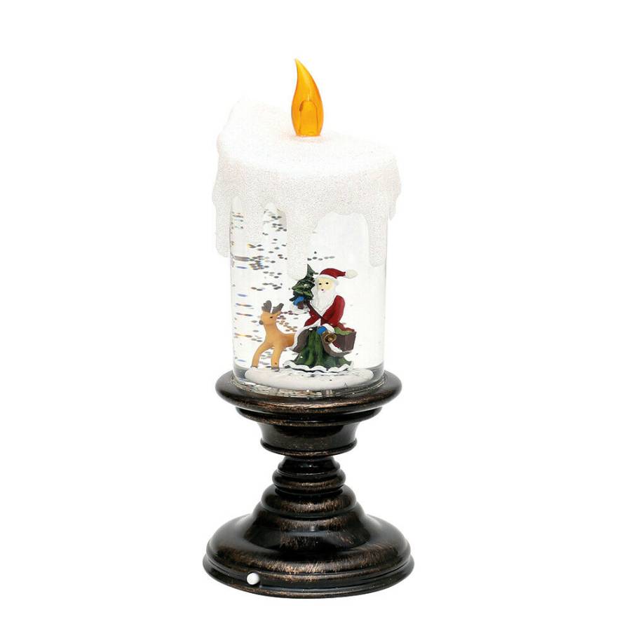 Kupferfarbener Kerzenständer durchsichtige Kerze mit Figuren im inneren und orangener Flamme