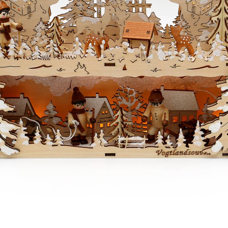 beleuchtete Schwibbogenbank mit Miniaturfiguren
