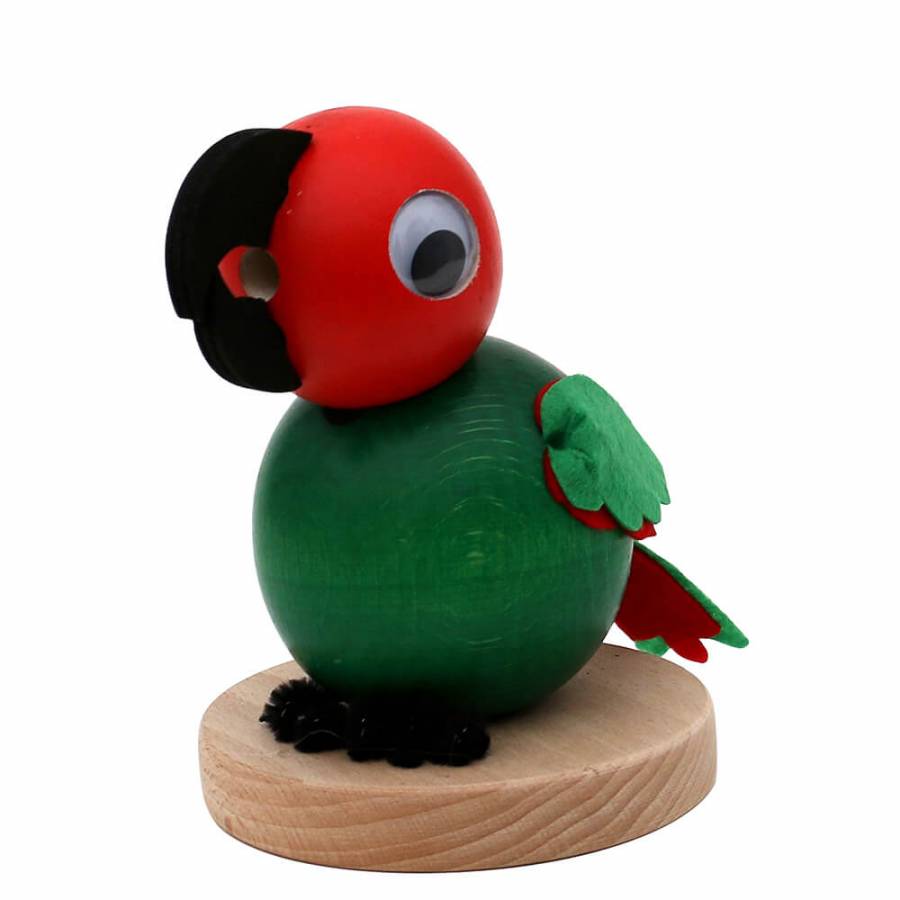Räucherfigur raeuchermaennchen Papagei mit grünem kugeligen Körper und roten kugelkopf. Große wackelaugen und ein schwarzer Schnabel