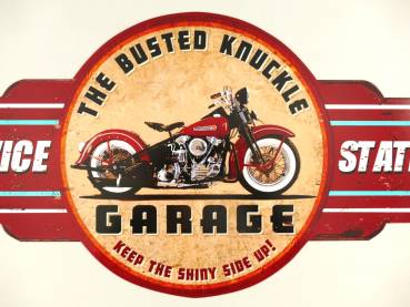 kreis mit rotem Motorrad  und unterschrift Garage